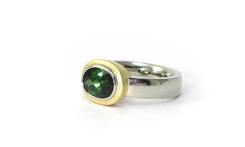 Gemstone ring in white and yellow gold 18k oval Green tourmaline by Martinus