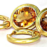 Oval Citrine and yellow gold hoop earrings